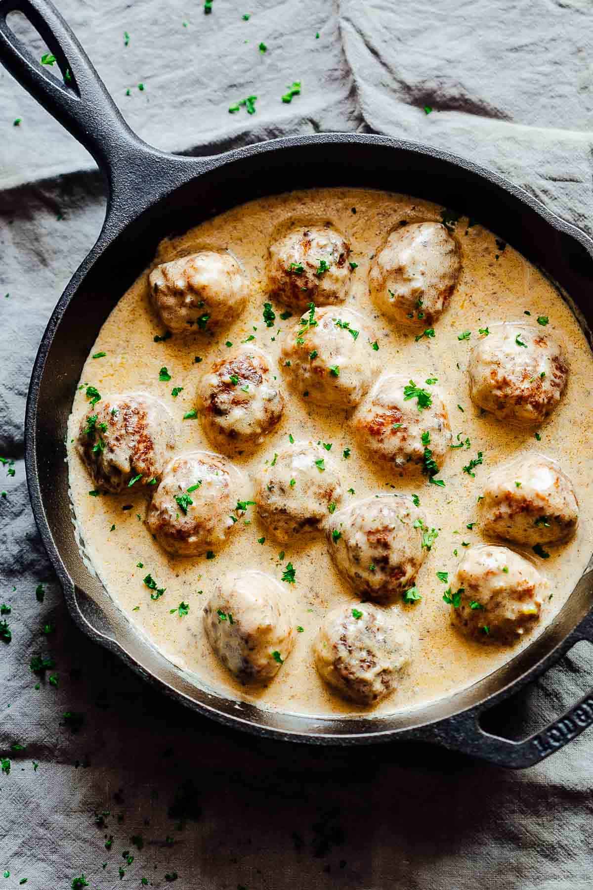 Chicken Meatballs in Mushroom Sauce in a cast iron pan