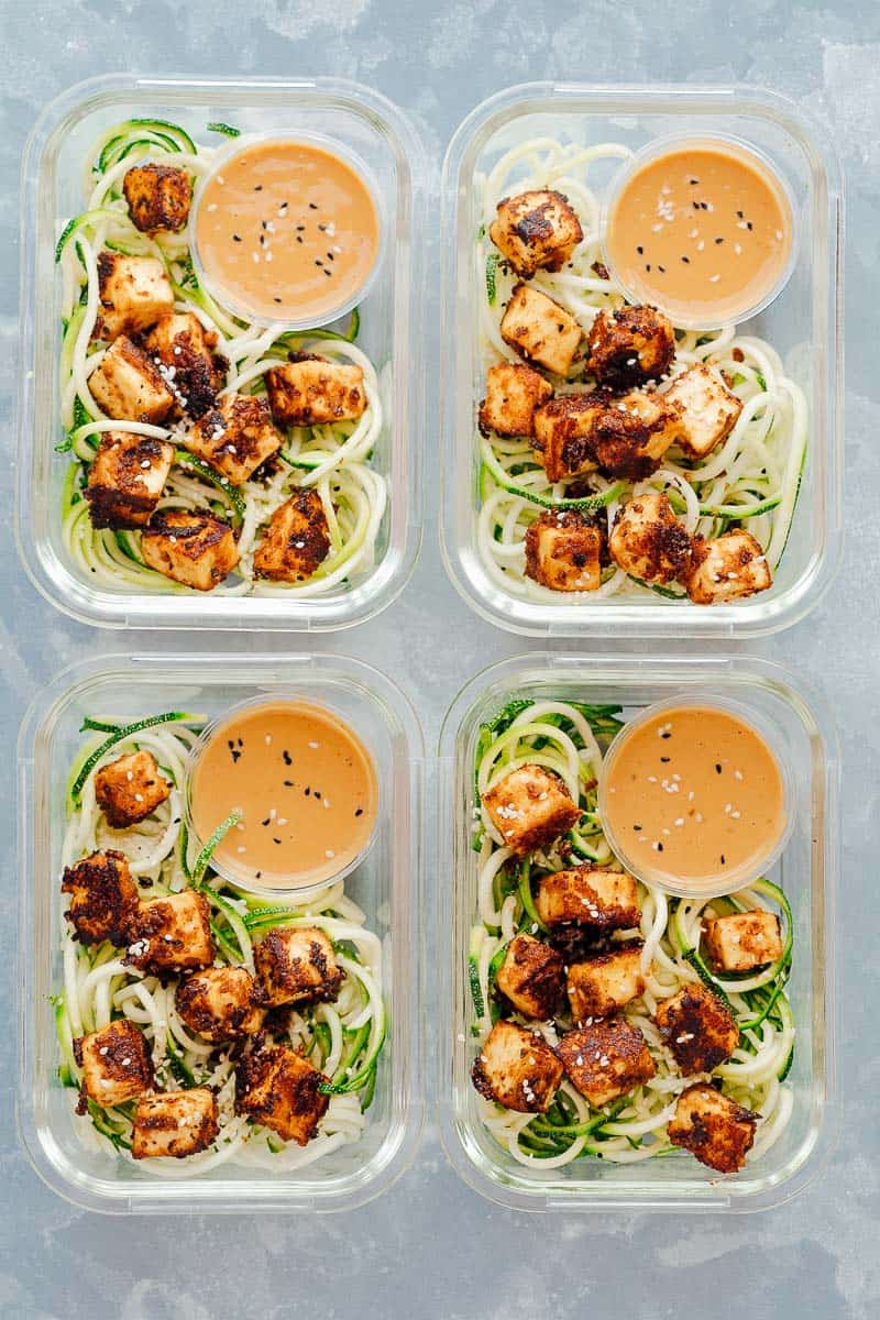 Crispy Sesame Tofu Zucchini Noodles in four meal prep containers
