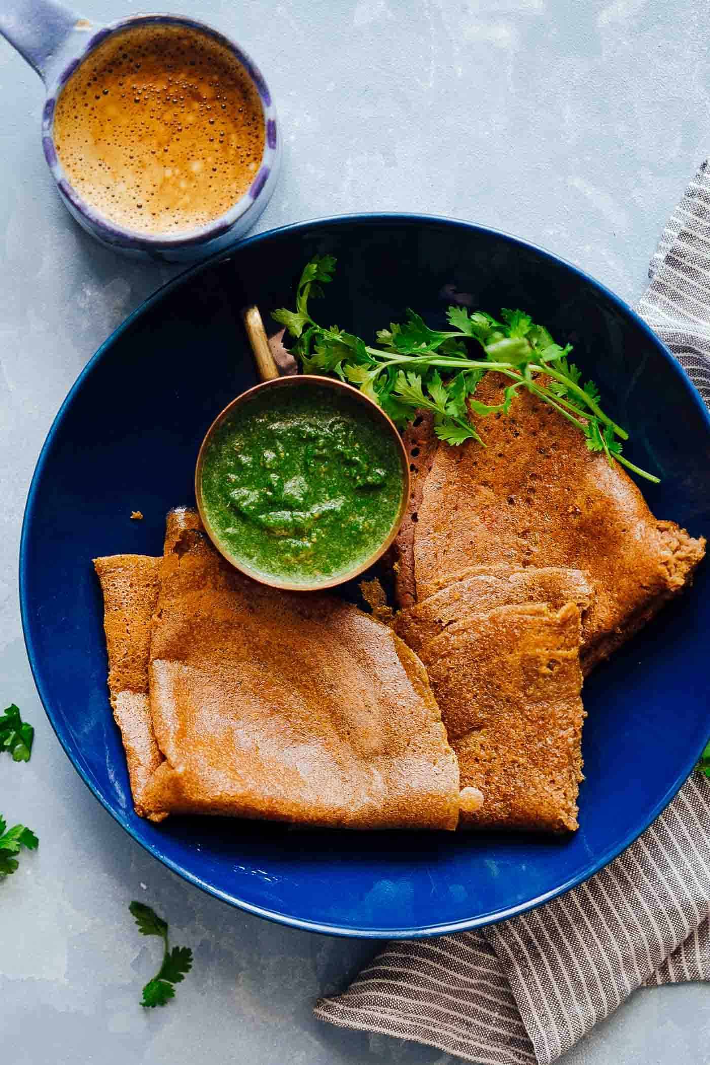 Oats are the easiest thing to make dosas with. The simple batter is made with instant oats and rice flour which is flavored with chilies and ginger. The next time you crave dosas at home and want something healthier, these oats dosas or pancakes will make your day.