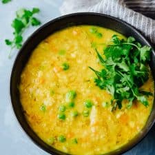 This healthy khichdi loaded with vegetables tastes just like the real deal, and is a take on the South Indian Pongal which is a nutritious, hearty breakfast option. Leftovers also make for a great lunch or dinner which is why a big pot of this will keep you happy all day!