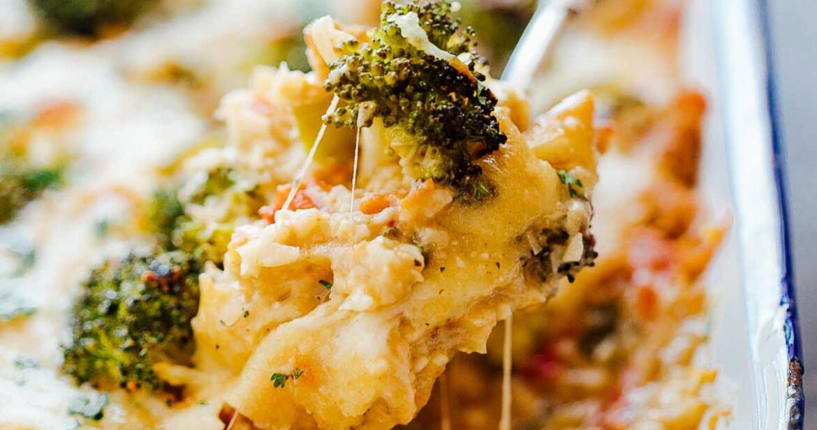 Cheesy spoonful of healthy cauliflower rice broccoli casserole.
