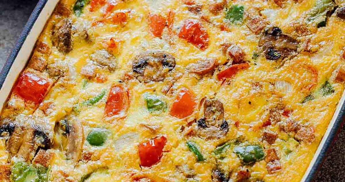 Baked Denver Omelet Breakfast Casserole in a baking dish straight out of the oven