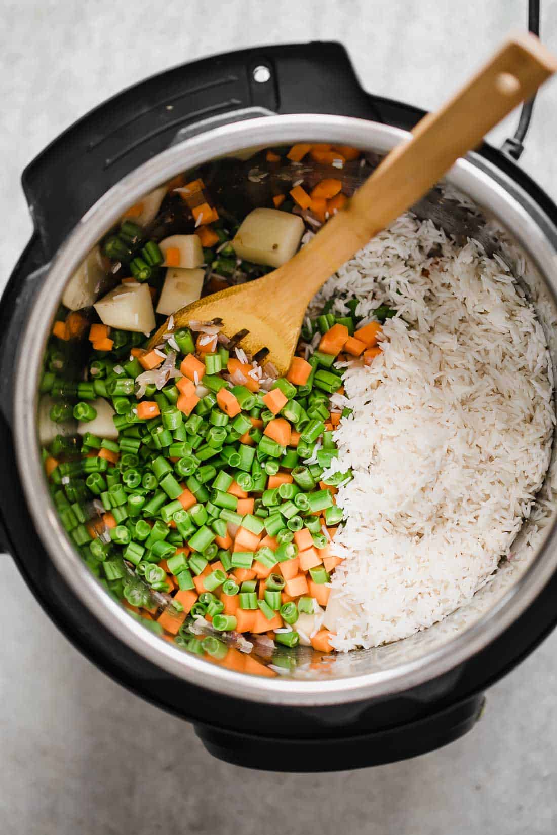 All the ingredients pictures in the Instant Pot for pressure cooker veg pulao