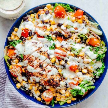 Southwest Chicken Quinoa Bean Salad is a hearty, delicious salad that's more like a meal. I have two dressing recipes for you to choose from - cilantro lime and a creamy southwest dressing with yogurt and sour cream. This salad recipe is a keeper for warm summer months!