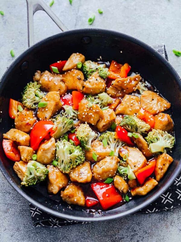 Easy Teriyaki Chicken with Broccoli in a black pan.