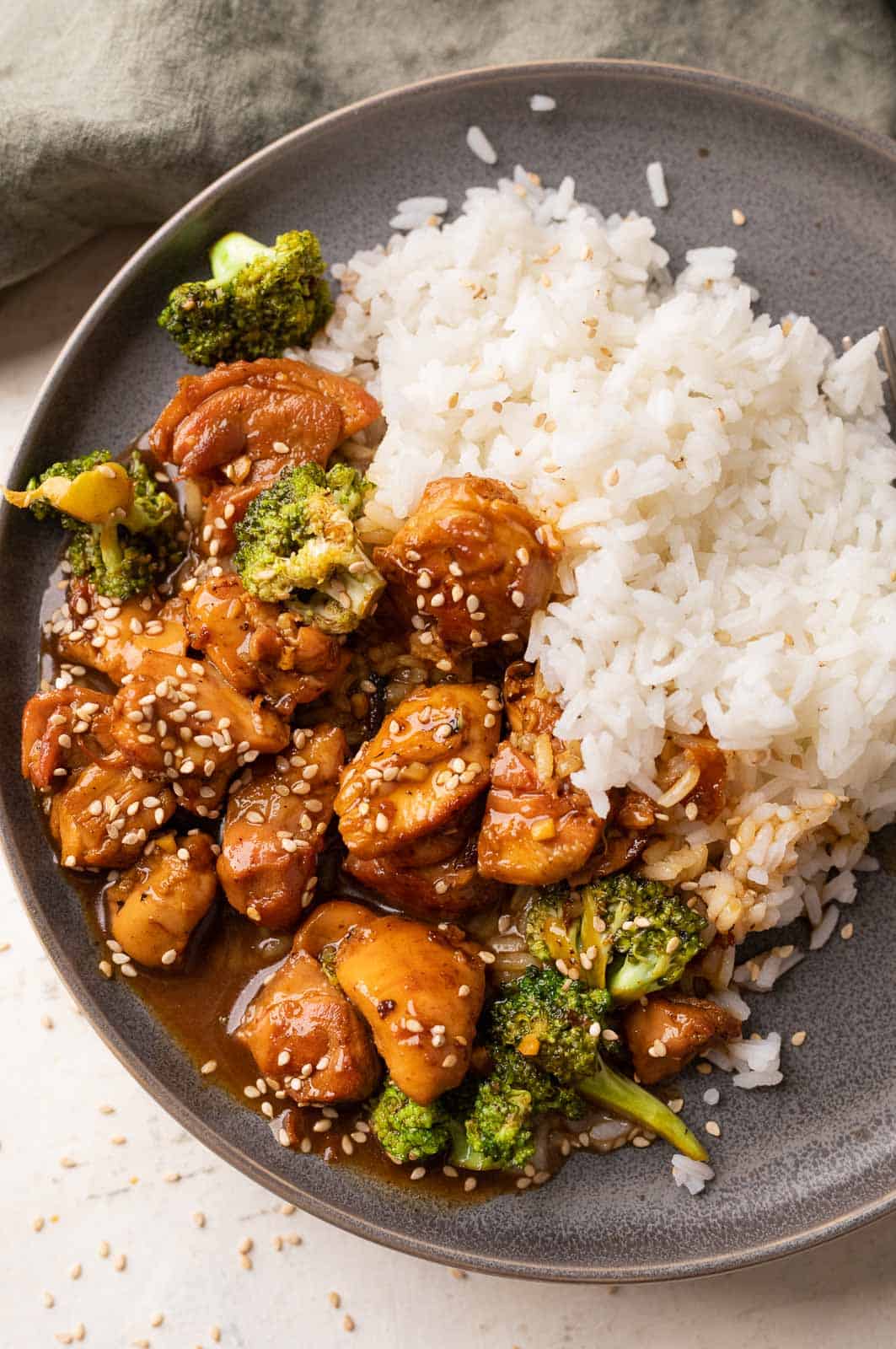 Teriyaki Chicken served on a plate with rice on the side
