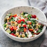 Easy Mediterranean chickpea salad served in a ceramic bowl with a spoon