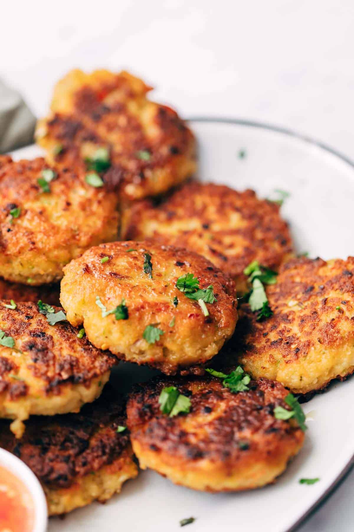 Easy Thai Shrimp Cakes served on a platter with thai sweet chilli sauce