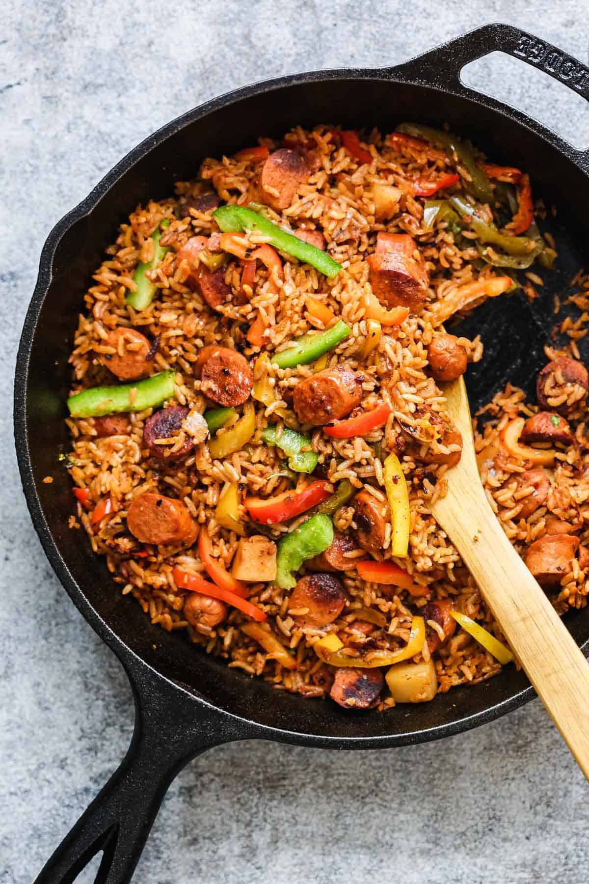 One Pot Mexican Rice and Sausages served in a cast iron pan
