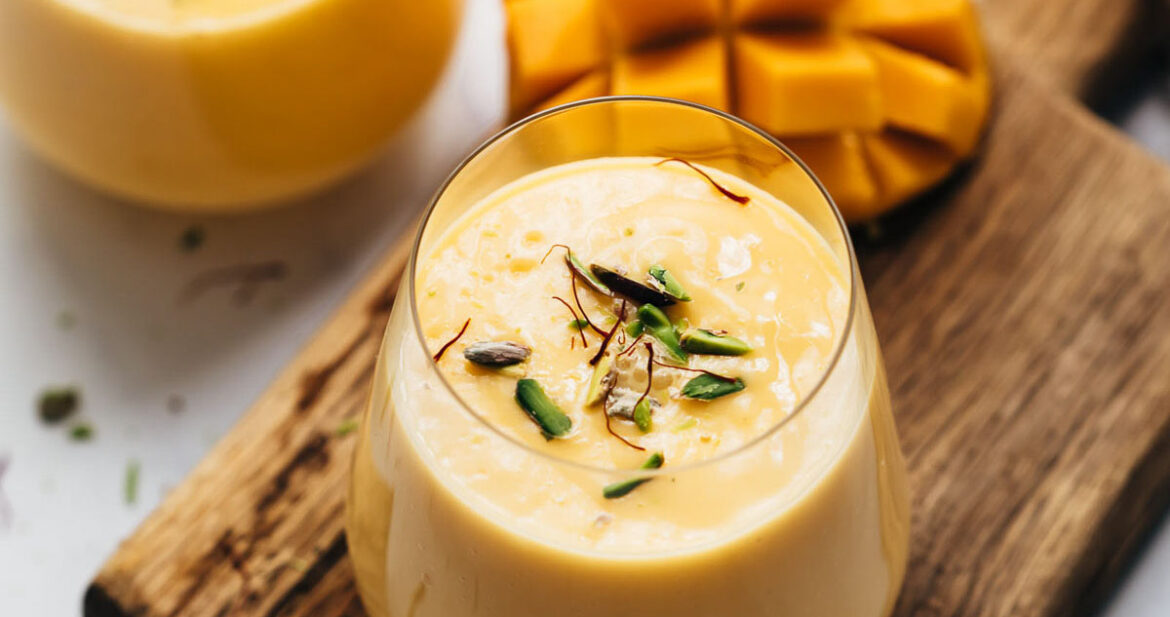 Two glasses of thick and creamy mango lassi