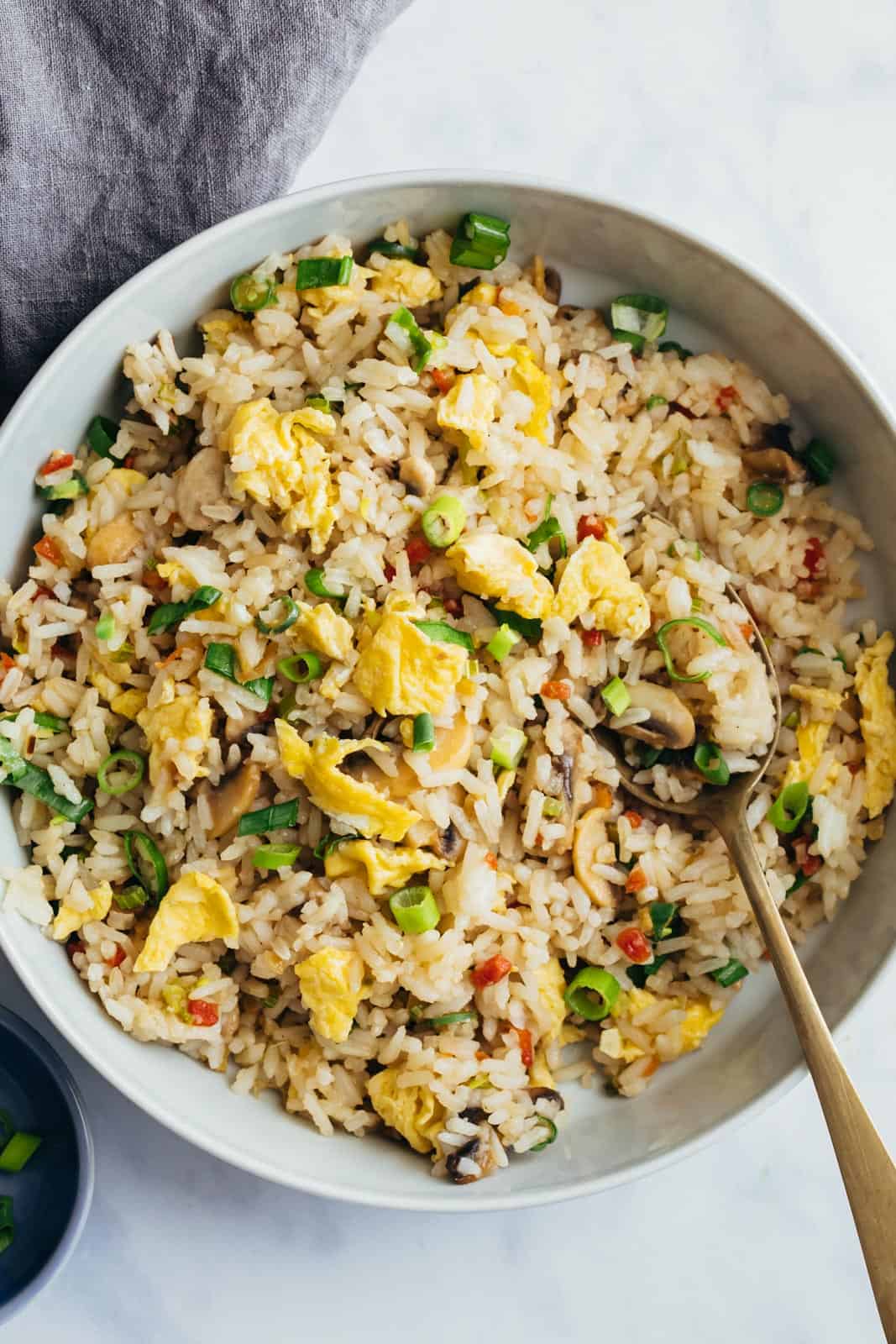 Egg Fried rice served in a bowl with a spoon