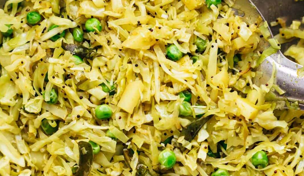 Potato Cabbage fry in a kadhai straight from the stove