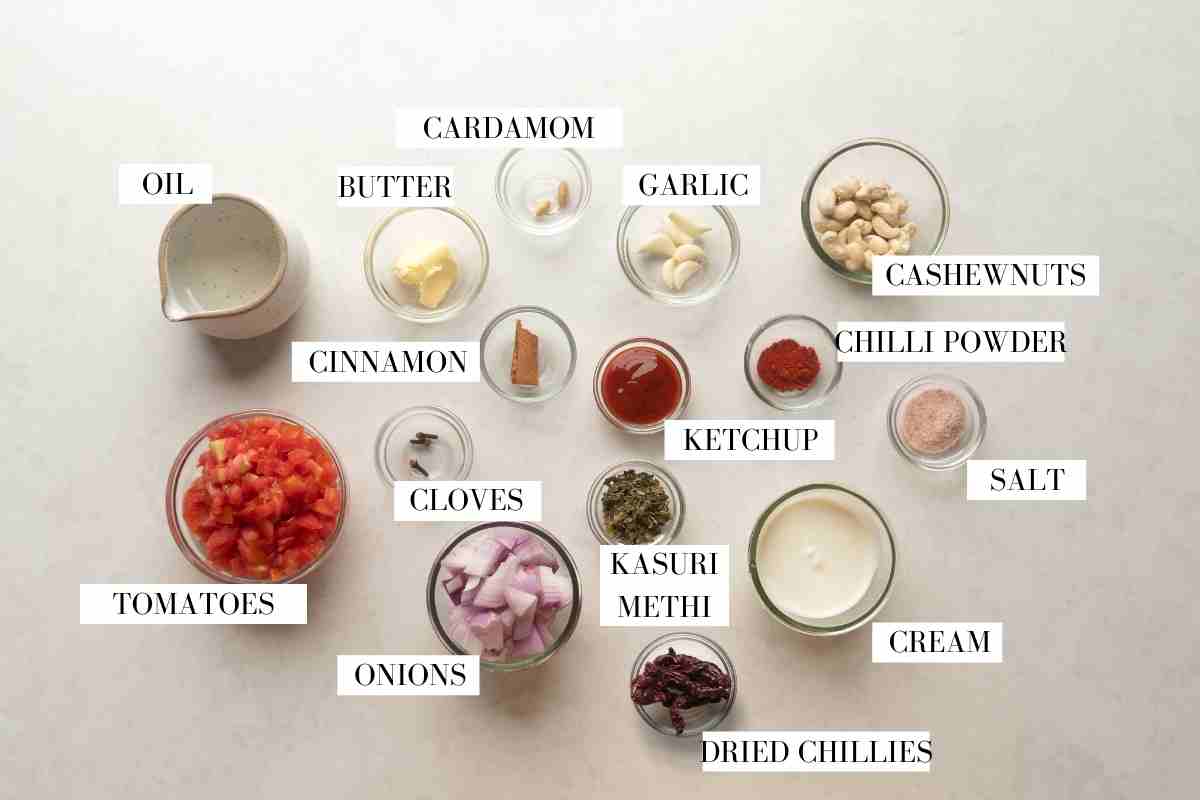 Picture of all the ingredients for butter chicken gravy with text to identify each ingredient