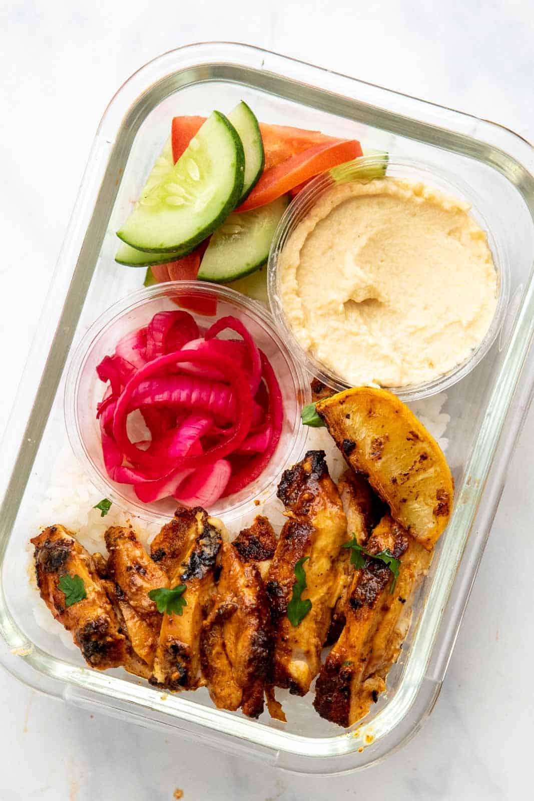 Chicken shawarma prepped in a container with rice as meal prep