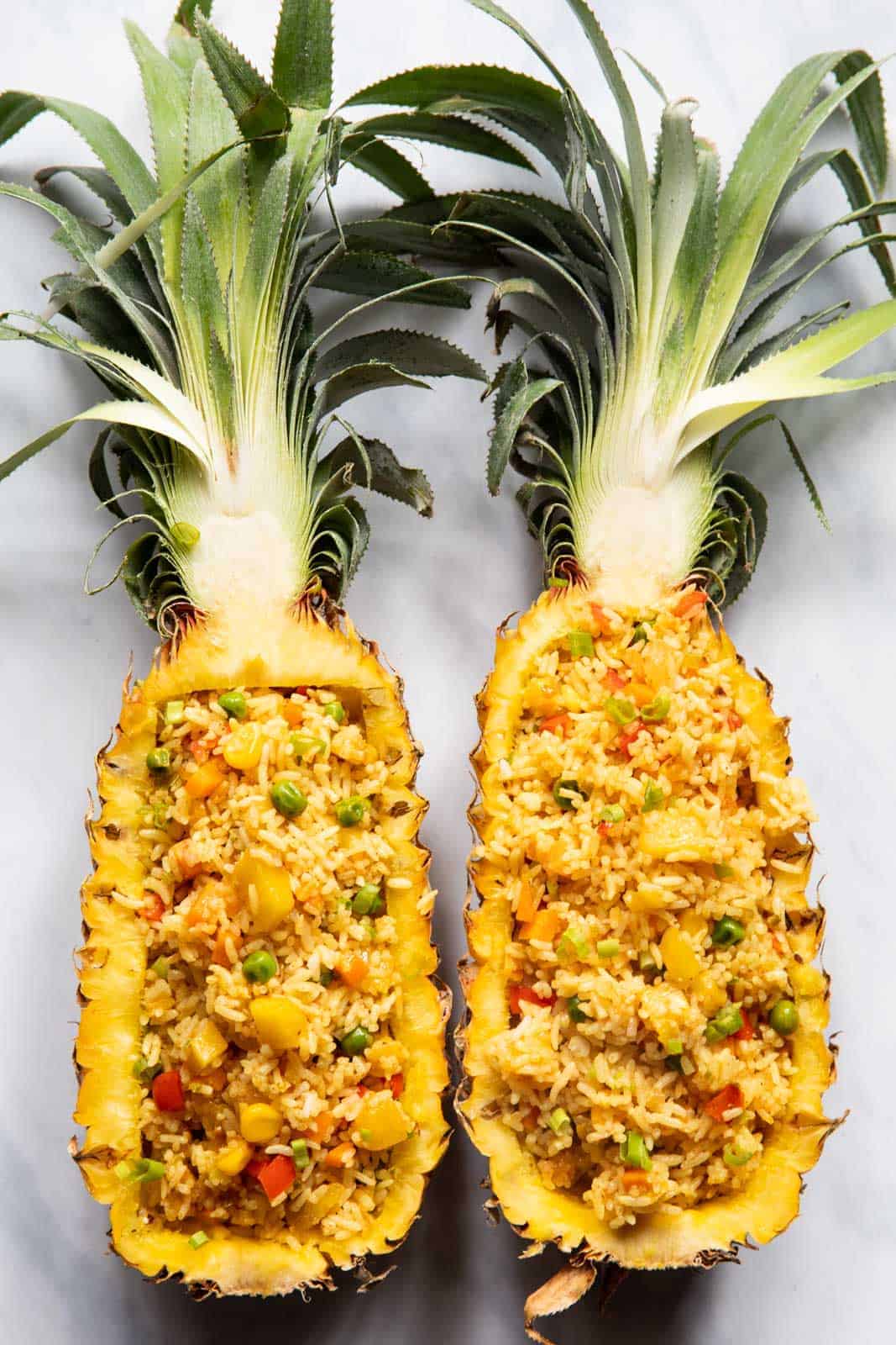 Thai Pineapple fried rice served in pineapple boats