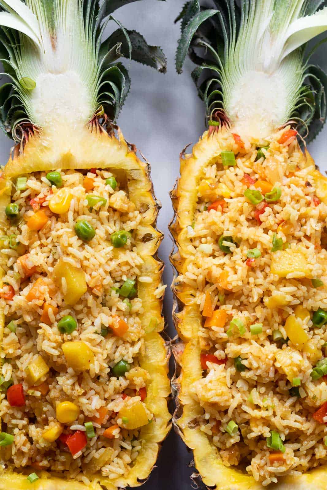 Thai Pineapple fried rice served in pineapple boats