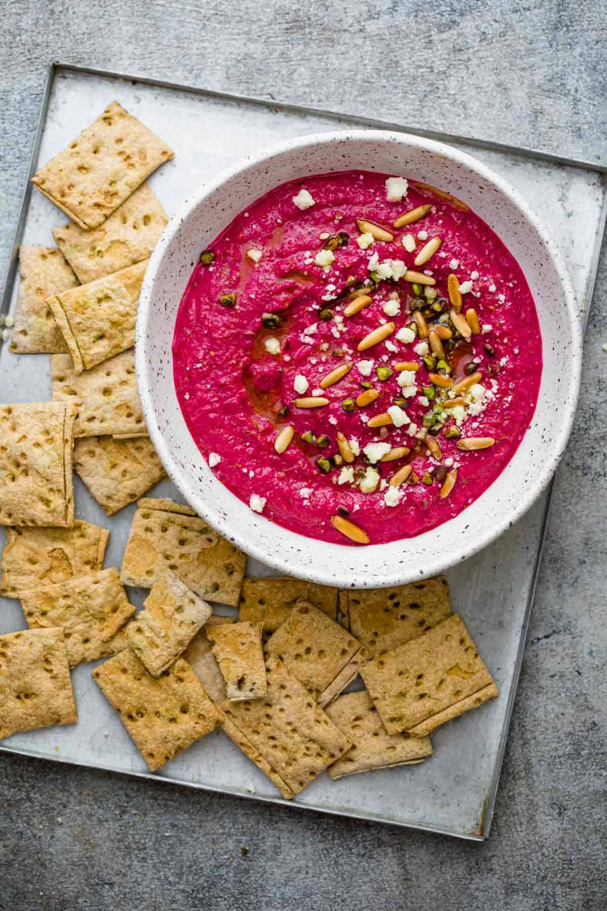 Egyptian Beetroot Dip served on a tray with crackers