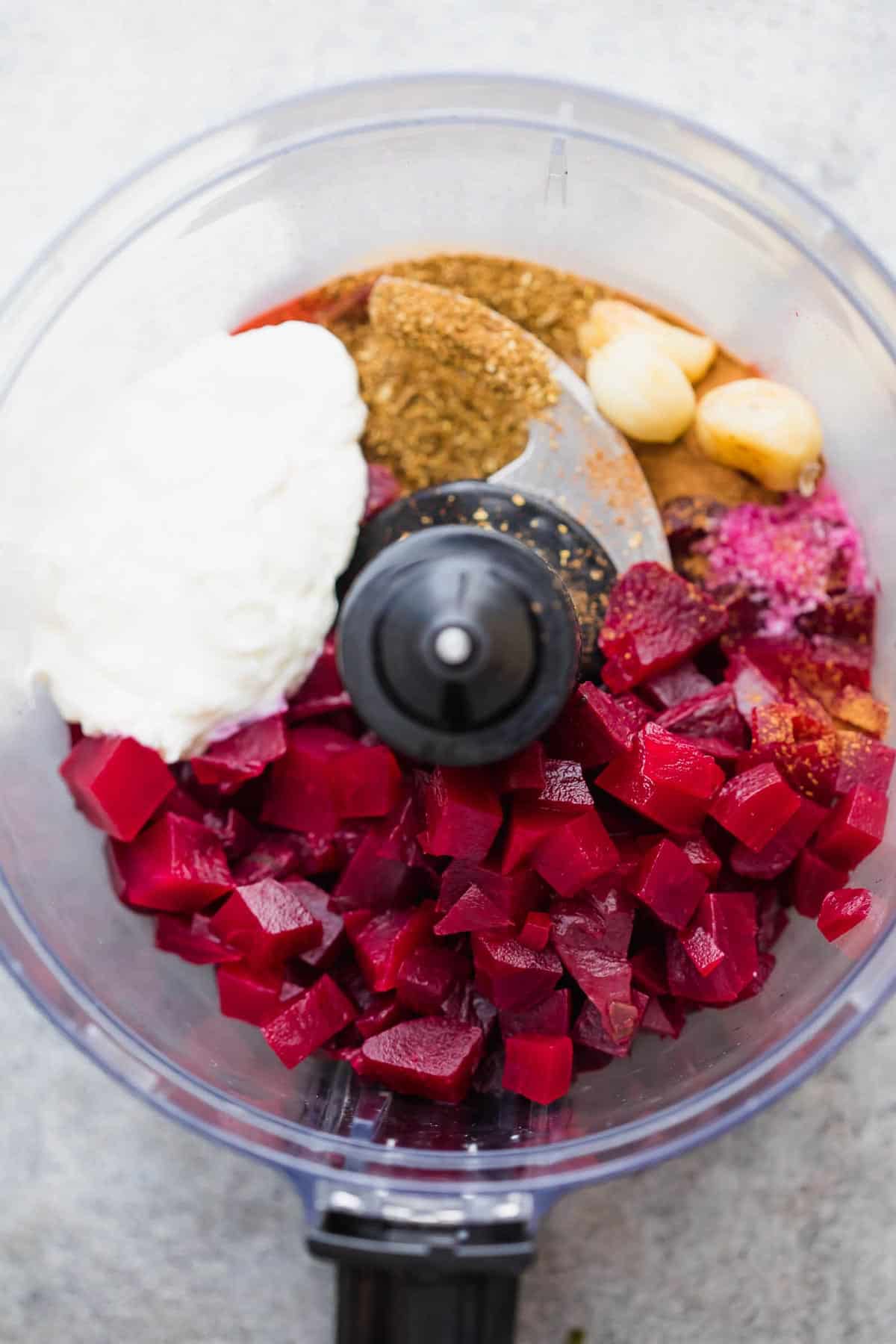 Ingredients of the egyptian beetroot dip in the food processor, just before they were blended