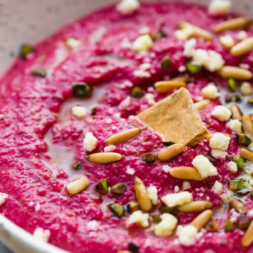 Egyptian Beetroot Dip in a white speckled bowl.