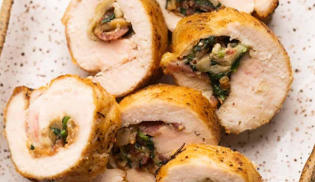 Sliced pieces of Chicken Roulade served on a platter