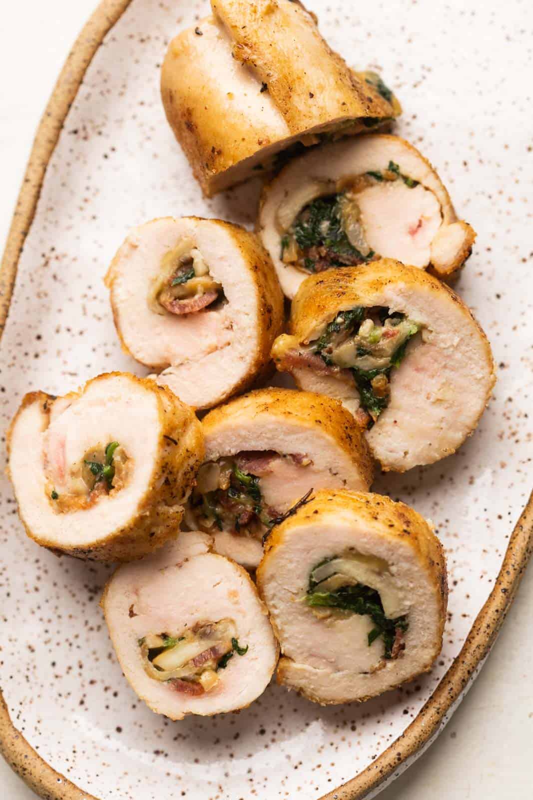 Sliced pieces of Chicken Roulade served on a platter