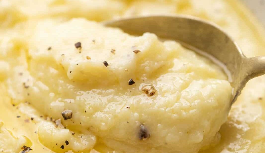 Closeup of a spoonful of creamy mashed potatoes