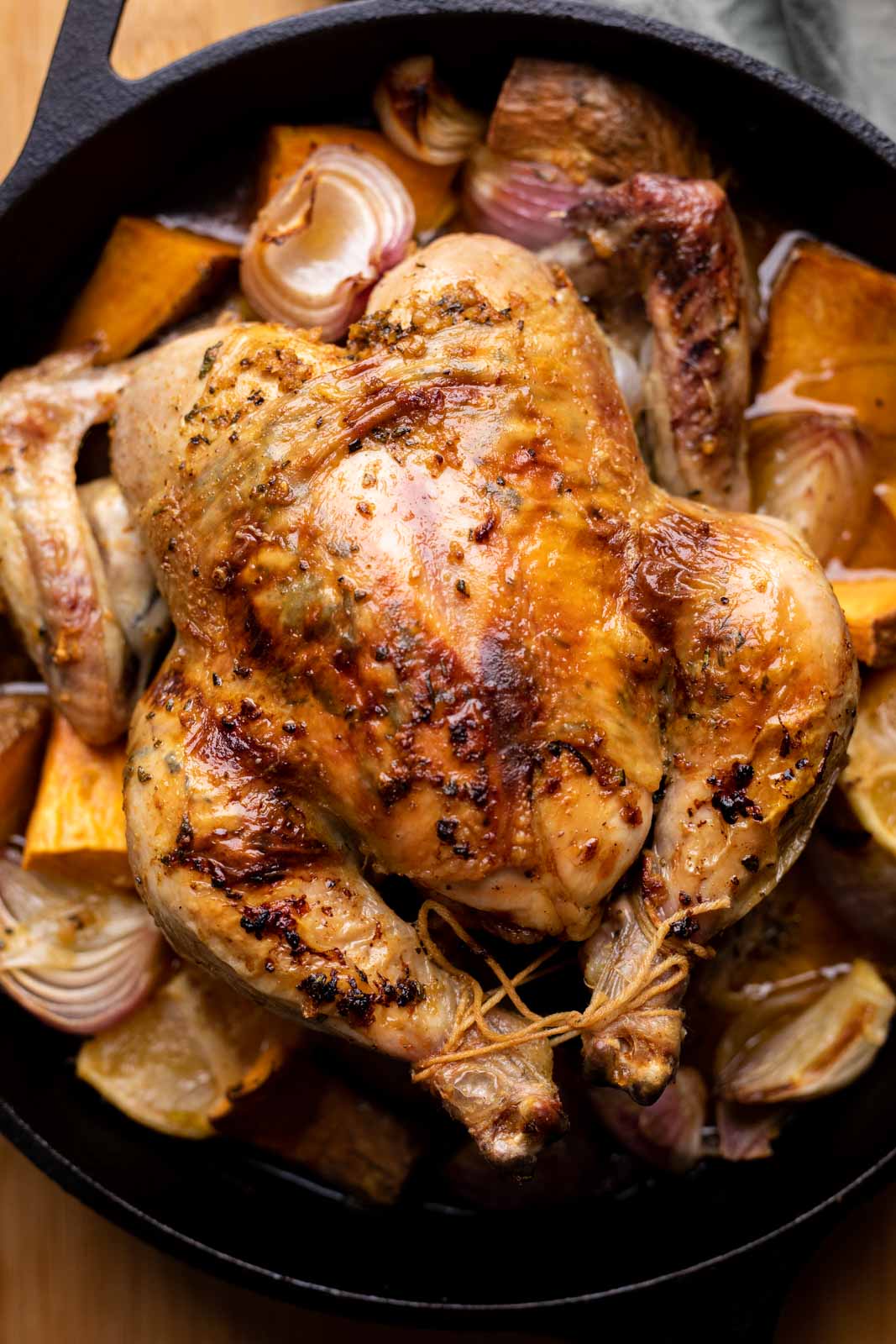 Roast chicken in the cast iron skillet, roasted with veggies and pan juices