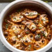 mushroom masala in a steel bowl ready for serving