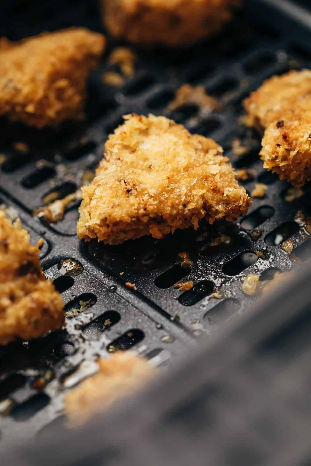 Closeup of Chicken Nugget in the Air Fryer basket