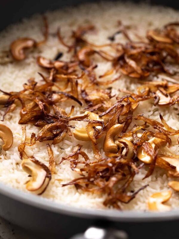 Closeup of the fried onions and cashew topping on ghee rice