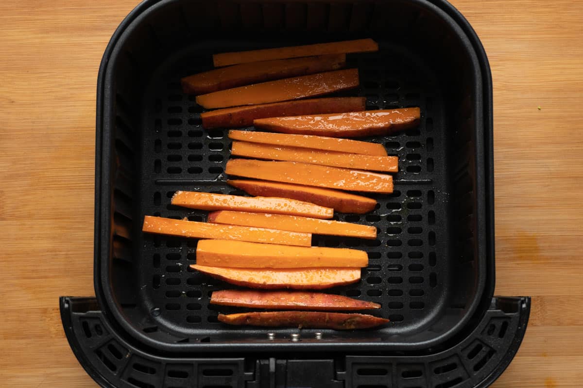 Picture of sweet potato fries placed in the air fryer