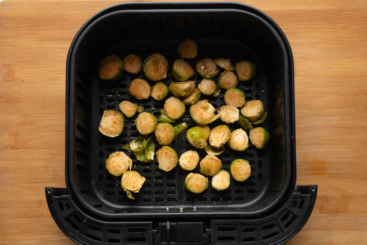 Picture of brussel sprouts added in one layer in the air fryer
