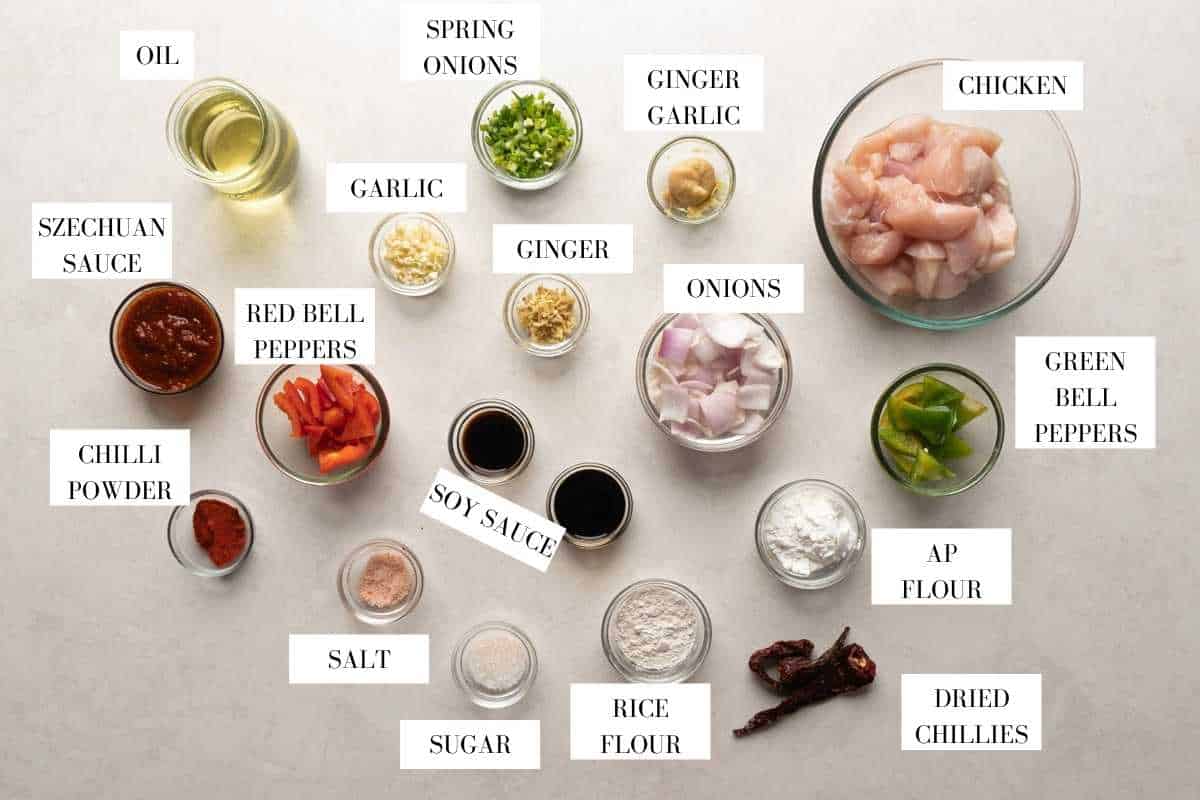 Picture of all the ingredients required for szechuan chicken with text to identify them