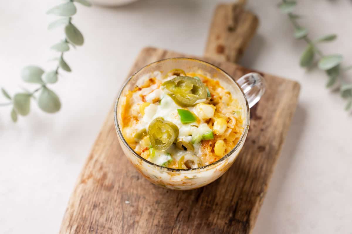 shot of microwave mexican cheesy rice in a mug