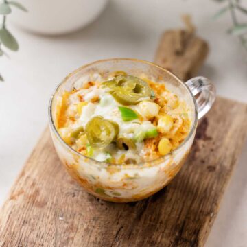 shot of microwave mexican cheesy rice in a mug