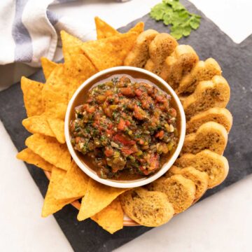 roasted tomato salsa served with nachos and crostini on the side