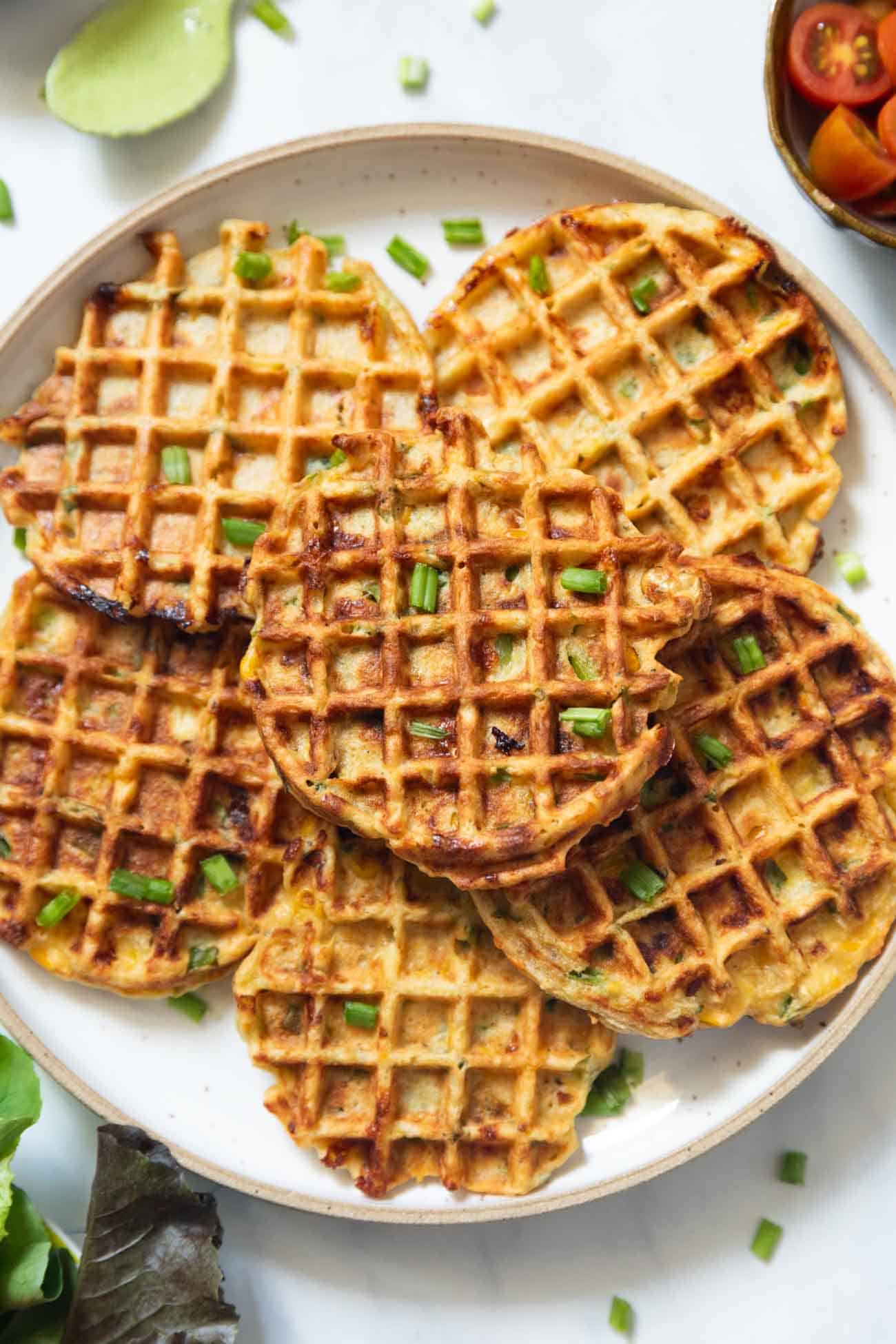 savoury corn cheese waffles served in a white plate
