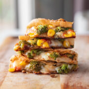 a stack of broccoli corn quesadilla on a wooden table