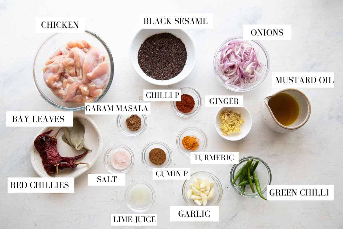 Picture of all the ingredients required for black sesame chicken with text to identify them