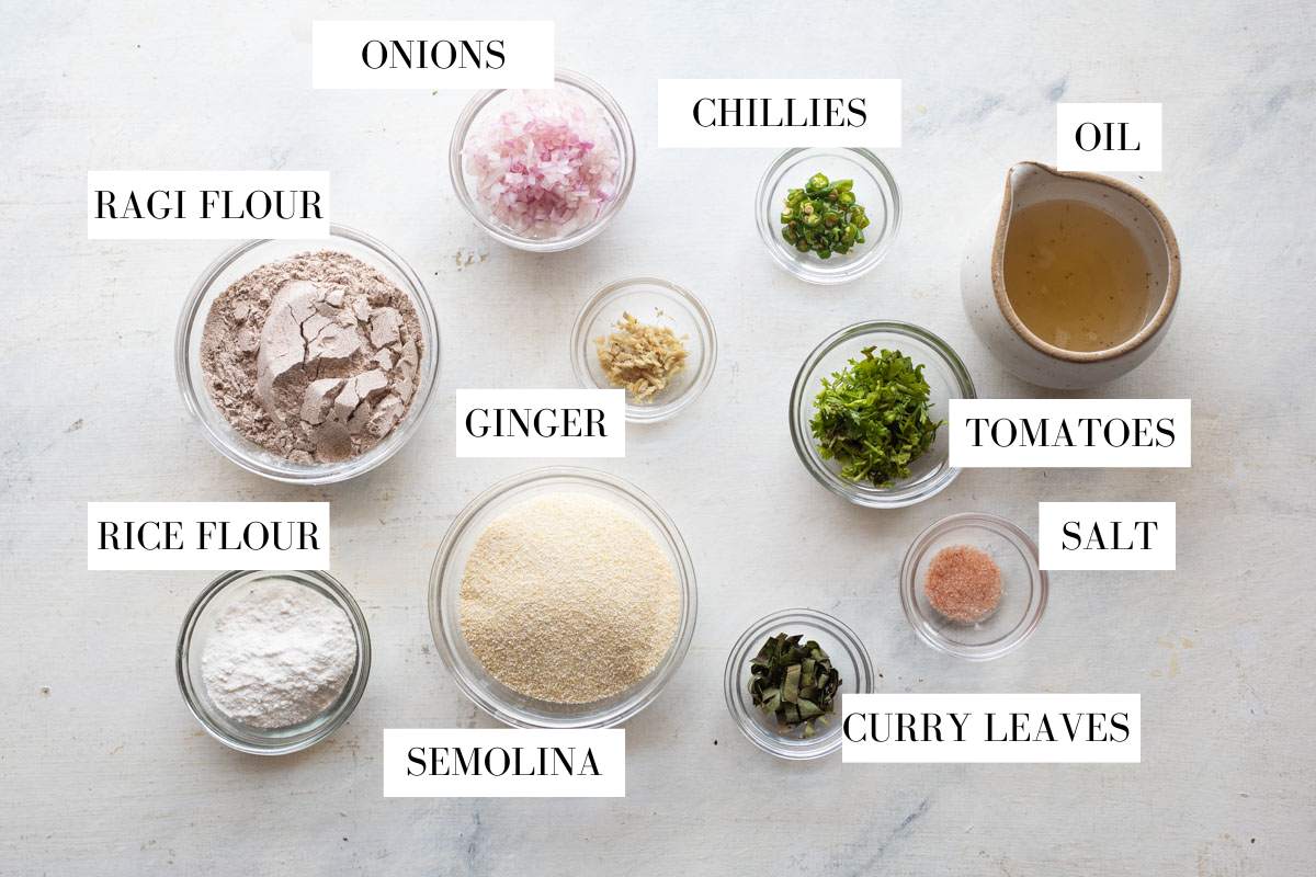Picture of all the ingredients required for ragi dosa with text overlay to identify them