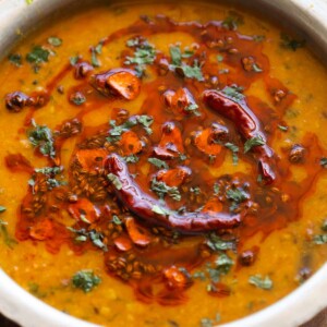 a close up image of dal tadka to show it's creamy texture and tadka