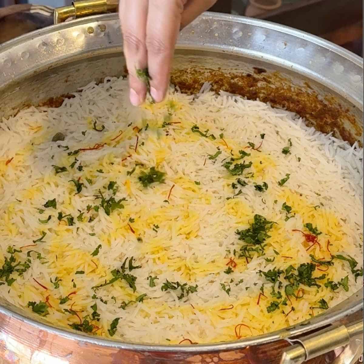 mushroom biryani step 3 - layering biryani