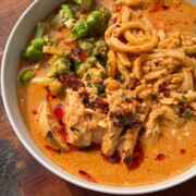 a close up image of peanut butter ramen noodles to showcase it's color and texture