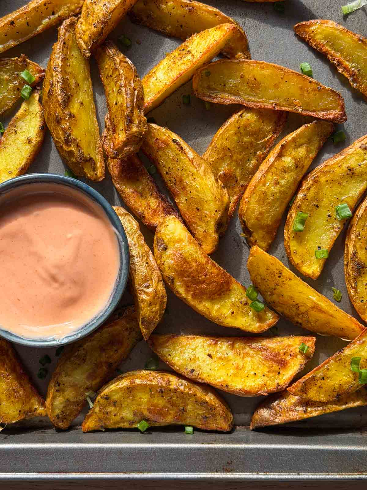 air fryer potato wedges with an accompanying dip
