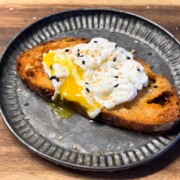 air fryer poached egg served on top of a toast