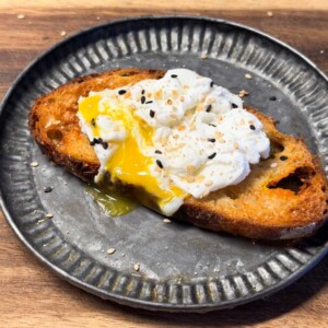 air fryer poached egg served on top of a toast
