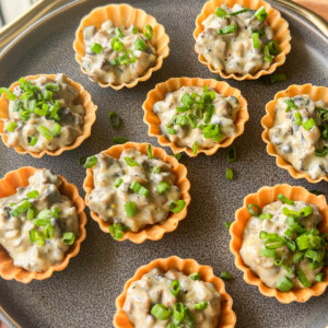 mini mushroom tarts assembled on a plate and ready to be served