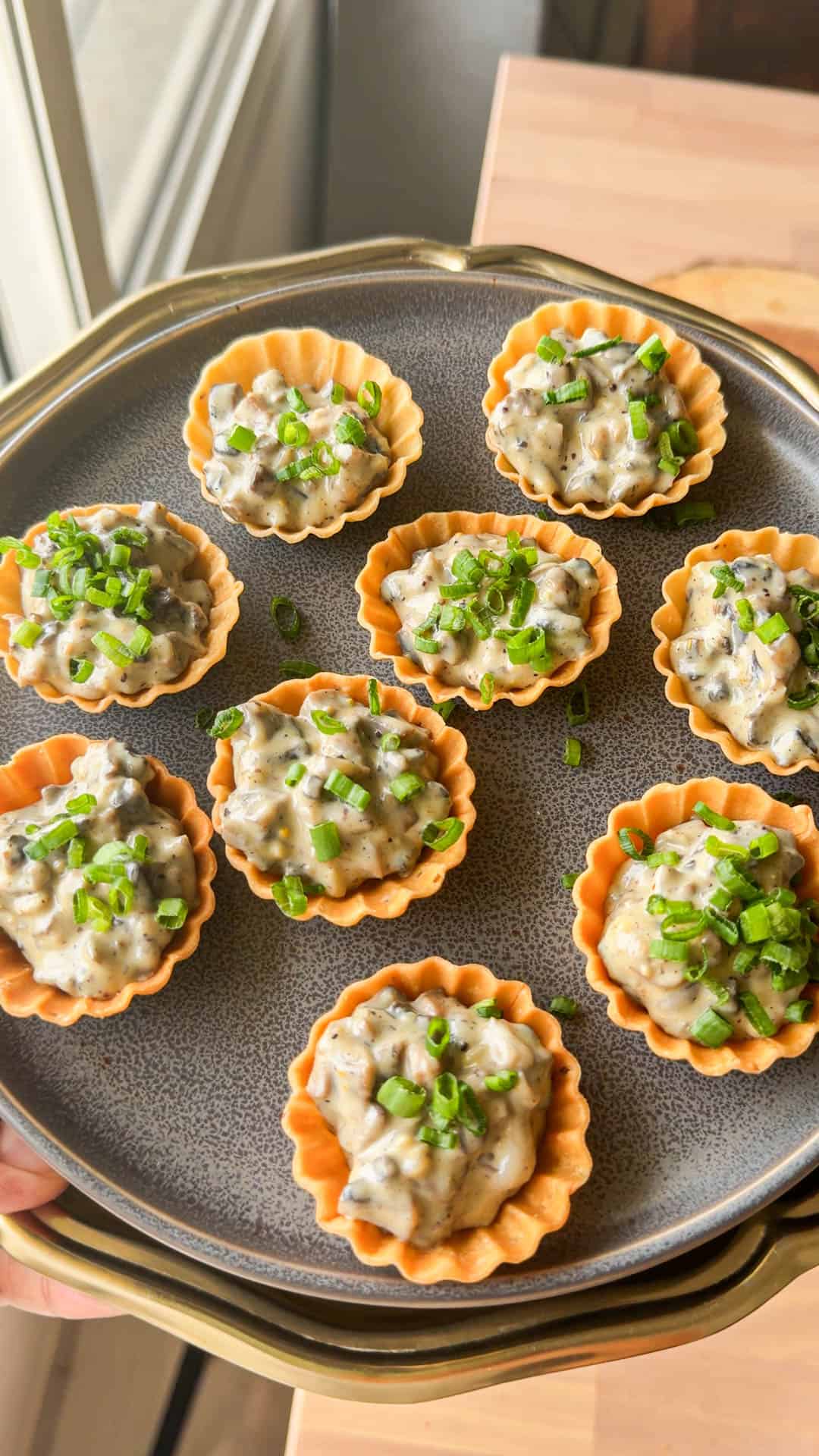 mini mushroom tarts assembled on a plate and ready to be served