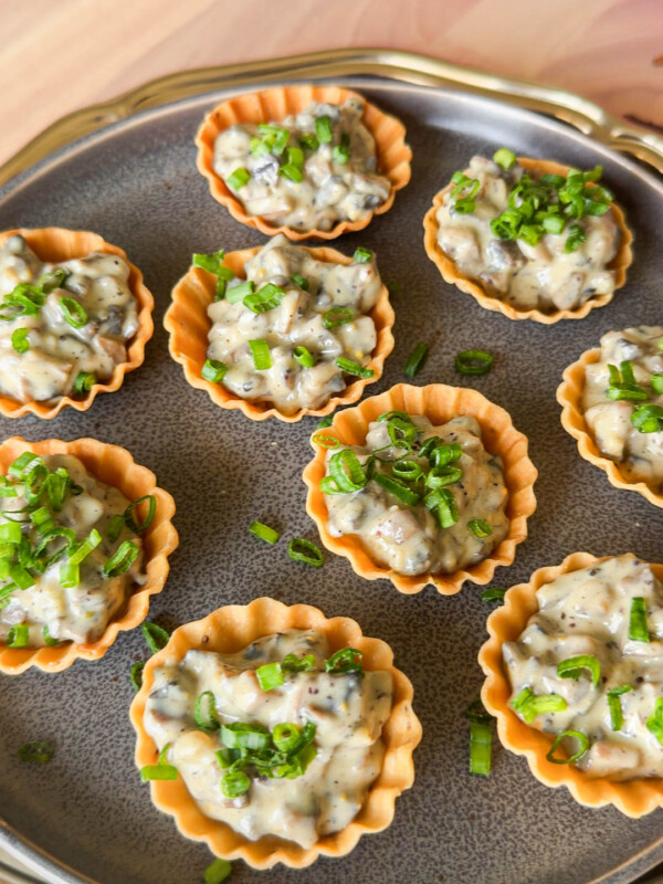 mini mushroom tarts assembled on a plate and ready to be served