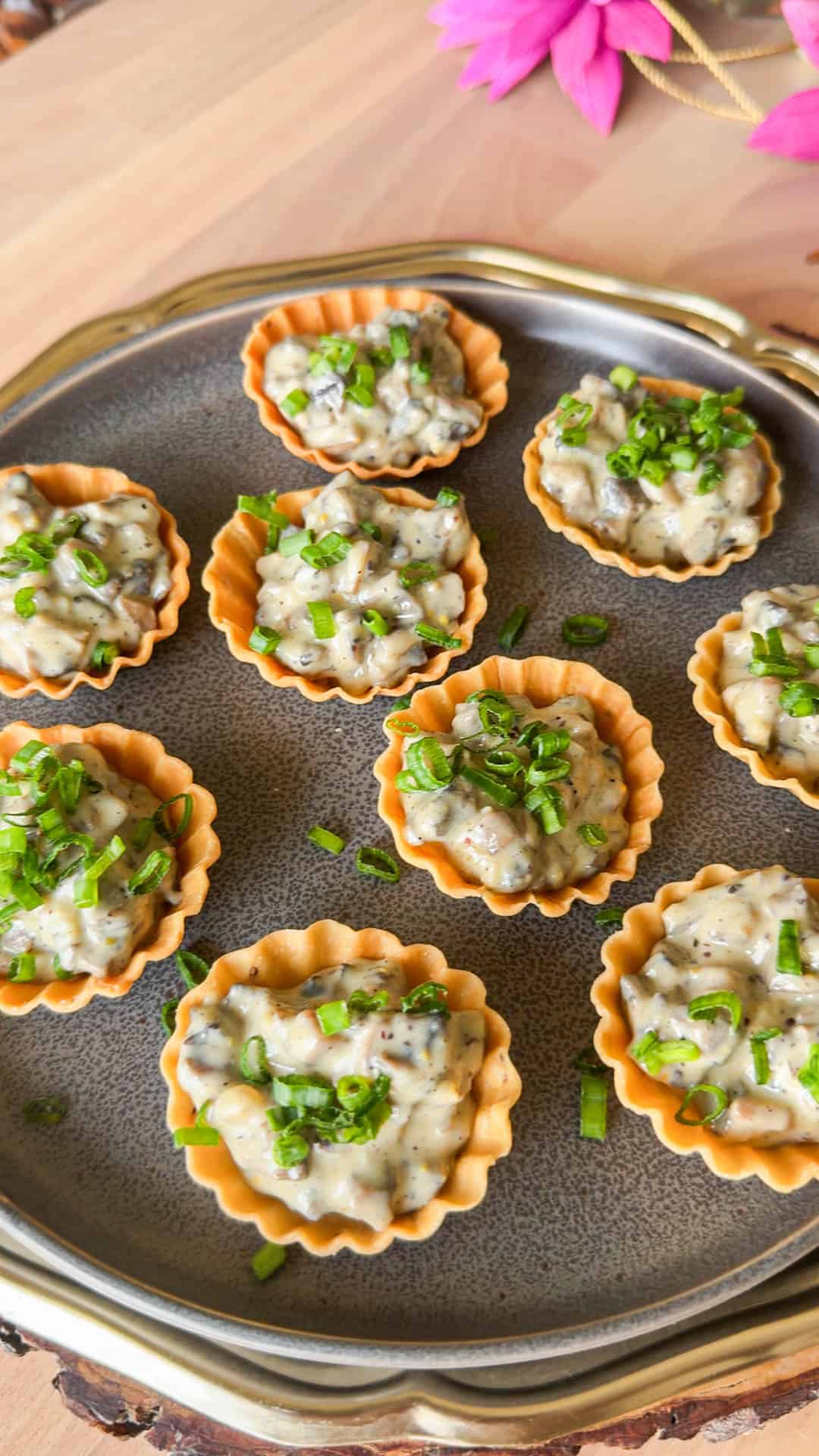 mini mushroom tarts assembled on a plate and ready to be served